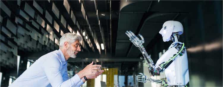 Man interacting with robot